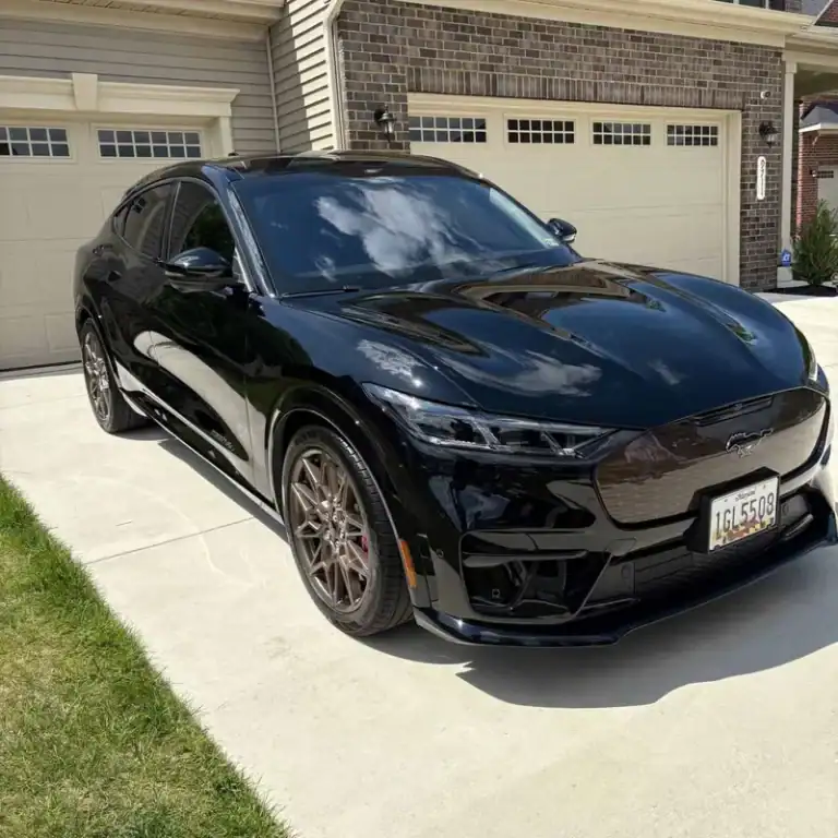 Black car parked in a driveway